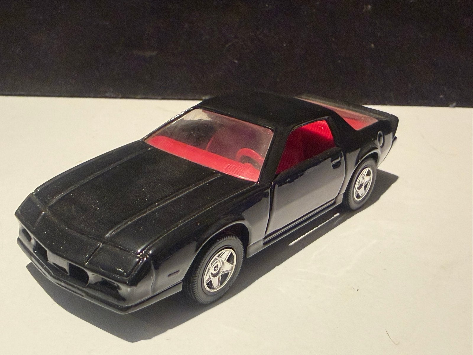 Solido Chevrolet Camaro Z28 1982 - Zwart met rood interieur, Ophalen of Verzenden, Gebruikt