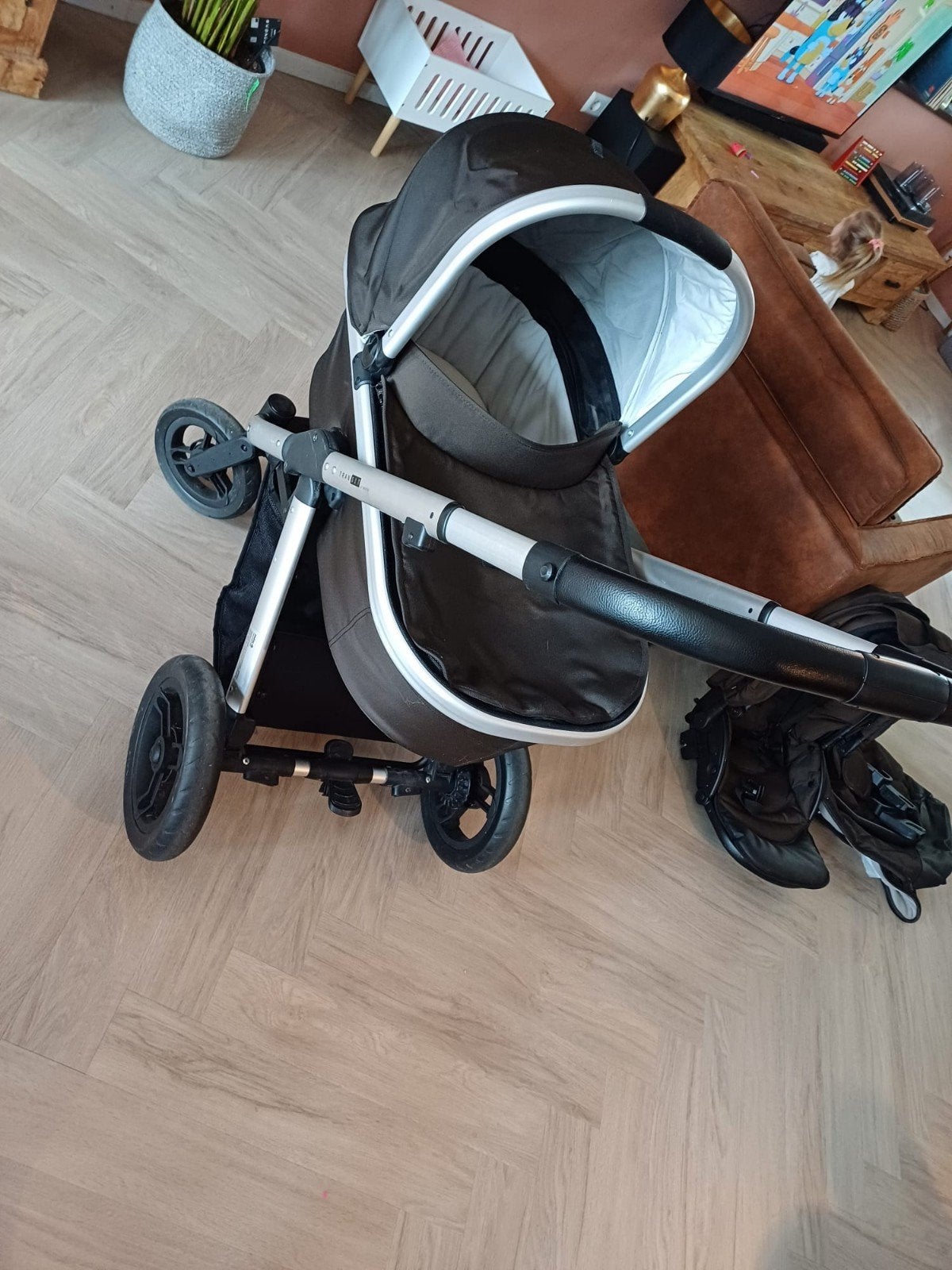 Nette kinderwagen, Ophalen