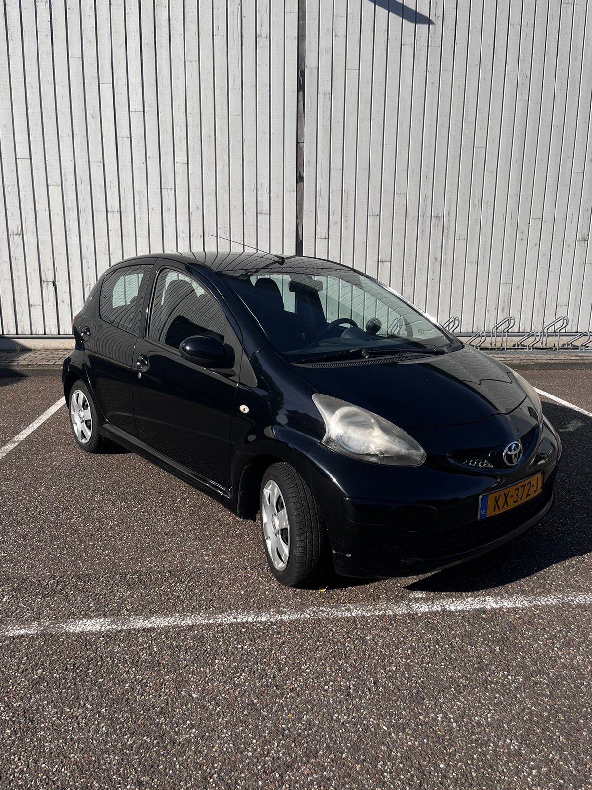 Toyota Aygo 1.0 5DRS 2007 Zwart, Auto's, Voorwielaandrijving, 4 stoelen, Handgeschakeld, Particulier