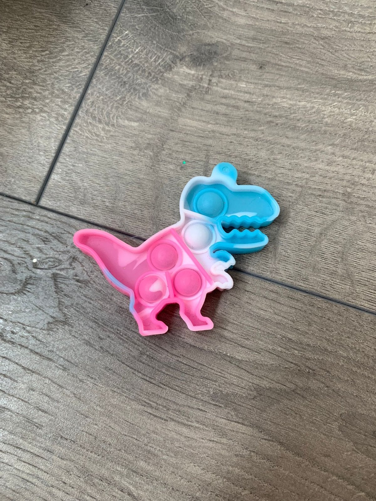 Kleine dino Pop It - Roze en Blauw, Ophalen of Verzenden, Gebruikt, Jongen of Meisje