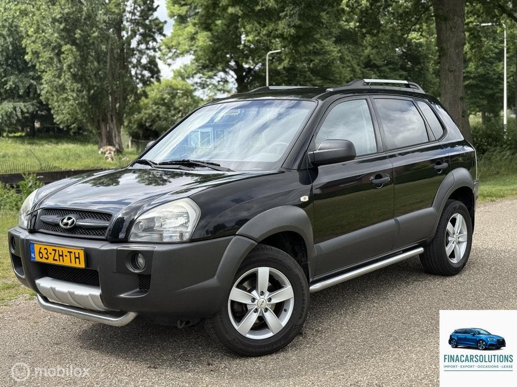 Hyundai Tucson 2.0i Dynamic, Auto's, Gebruikt, Zwart, Origineel Nederlands, Handgeschakeld