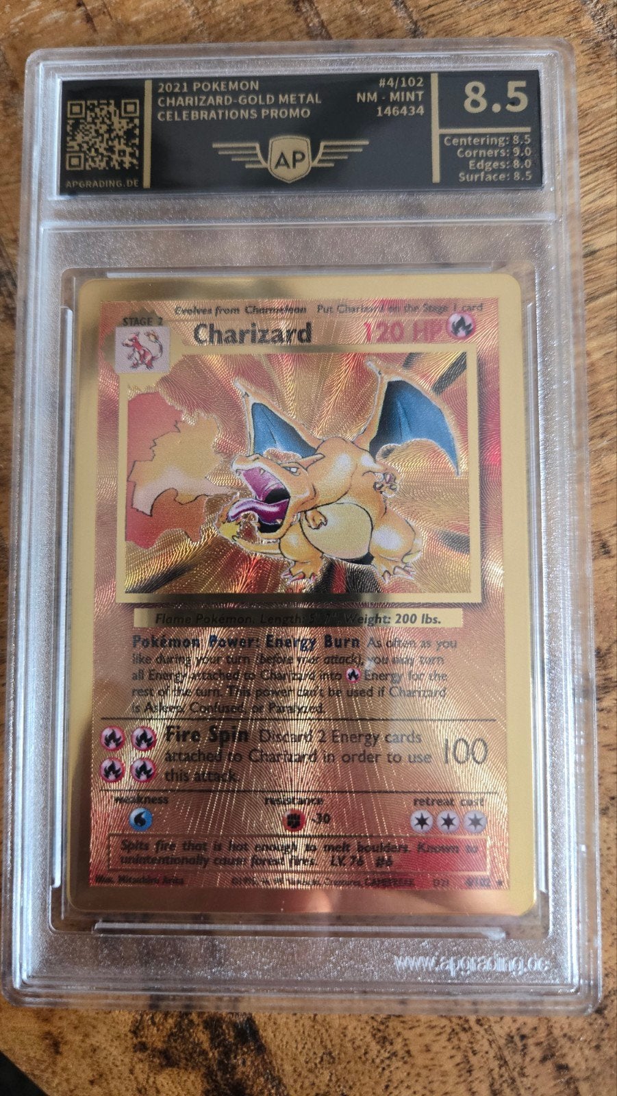 2021 Pokémon Charizard Gold Metal Celebrations Promo 8.5, Ophalen of Verzenden, Zo goed als nieuw, Losse kaart, Foil