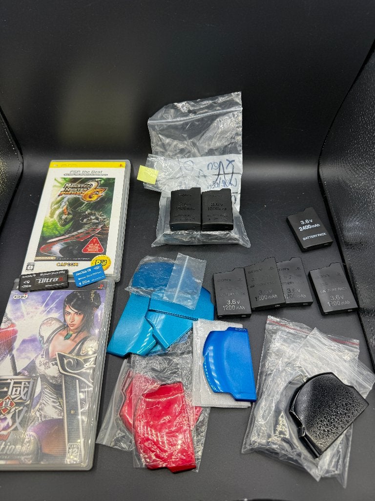 PSP (1000,2000,3000) lot. accu's batterij klepjes e.d., Ophalen of Verzenden, Zo goed als nieuw, PSP, Accu of Oplader