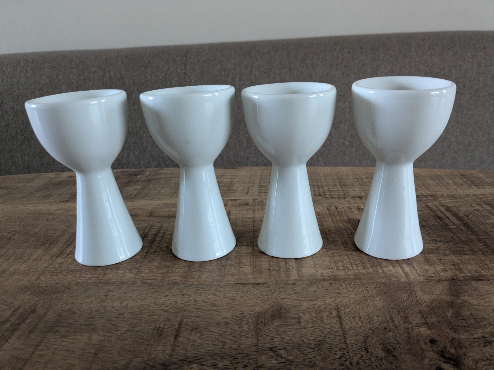 Set van 4 witte eierdopjes op voet, Ophalen of Verzenden