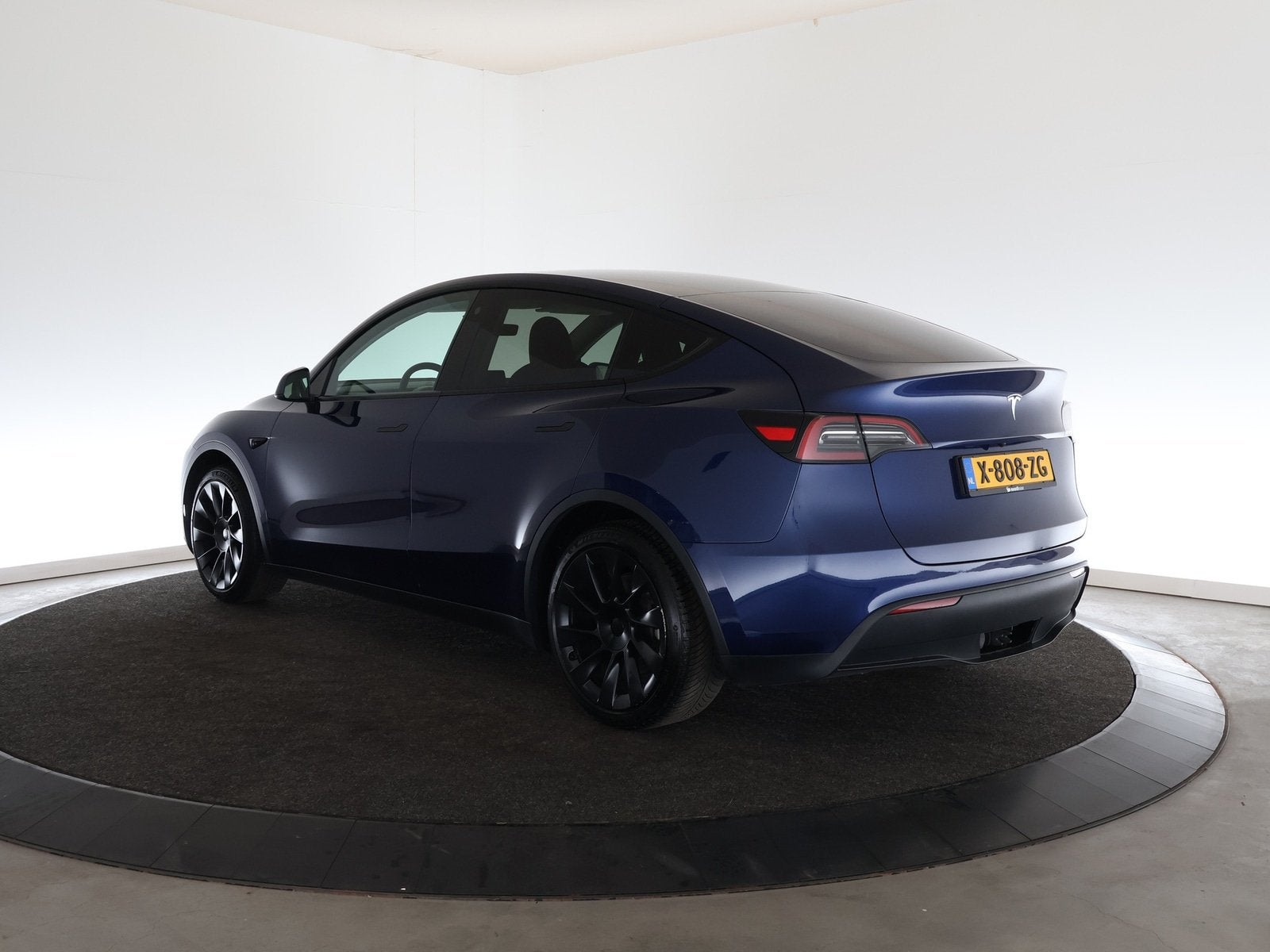 Tesla Model Y RWD 58 kWh | Trekhaak | 20'' | Leder | 12 maan, Auto's, 238 pk, Achterwielaandrijving, Gebruikt, Zwart