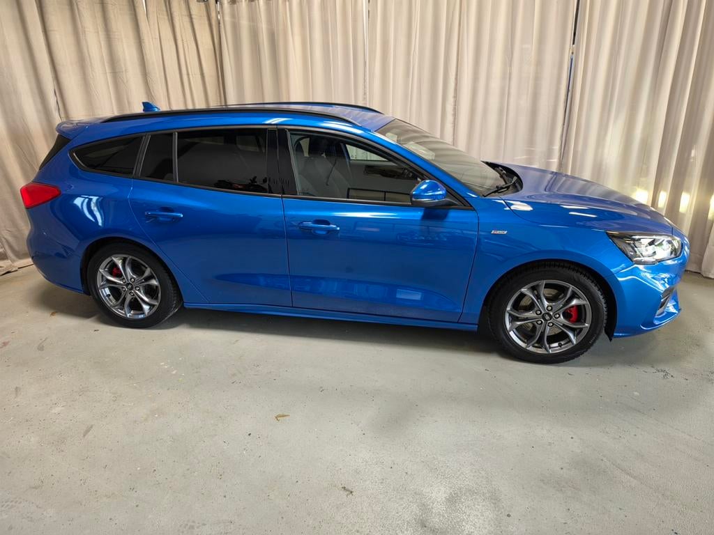 Ford Focus 1.0 ST-Line x Business Hybrid 125pk 2020 Blauw, Auto's, Stof, Blauw, 19 km/l, Hybride Elektrisch/Benzine