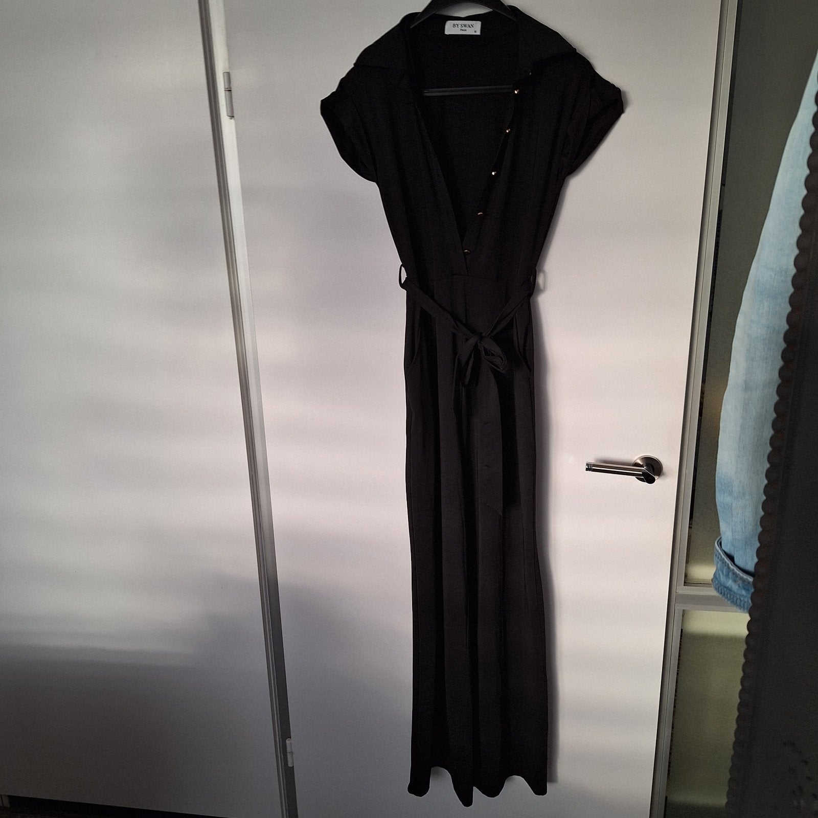 Nieuwe zwarte jumpsuit S/M extra lang travelstof wijde pijp, Kleding | Dames, Jumpsuits, Zwart, Nieuw, Ophalen of Verzenden, Maat 36 (S)