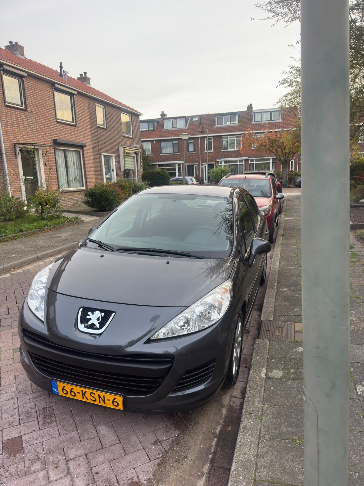 Peugeot 207 1.4 5DRS 2010 Grijs, Auto's, Voorwielaandrijving, 4 cilinders, 49 €/maand, Origineel Nederlands