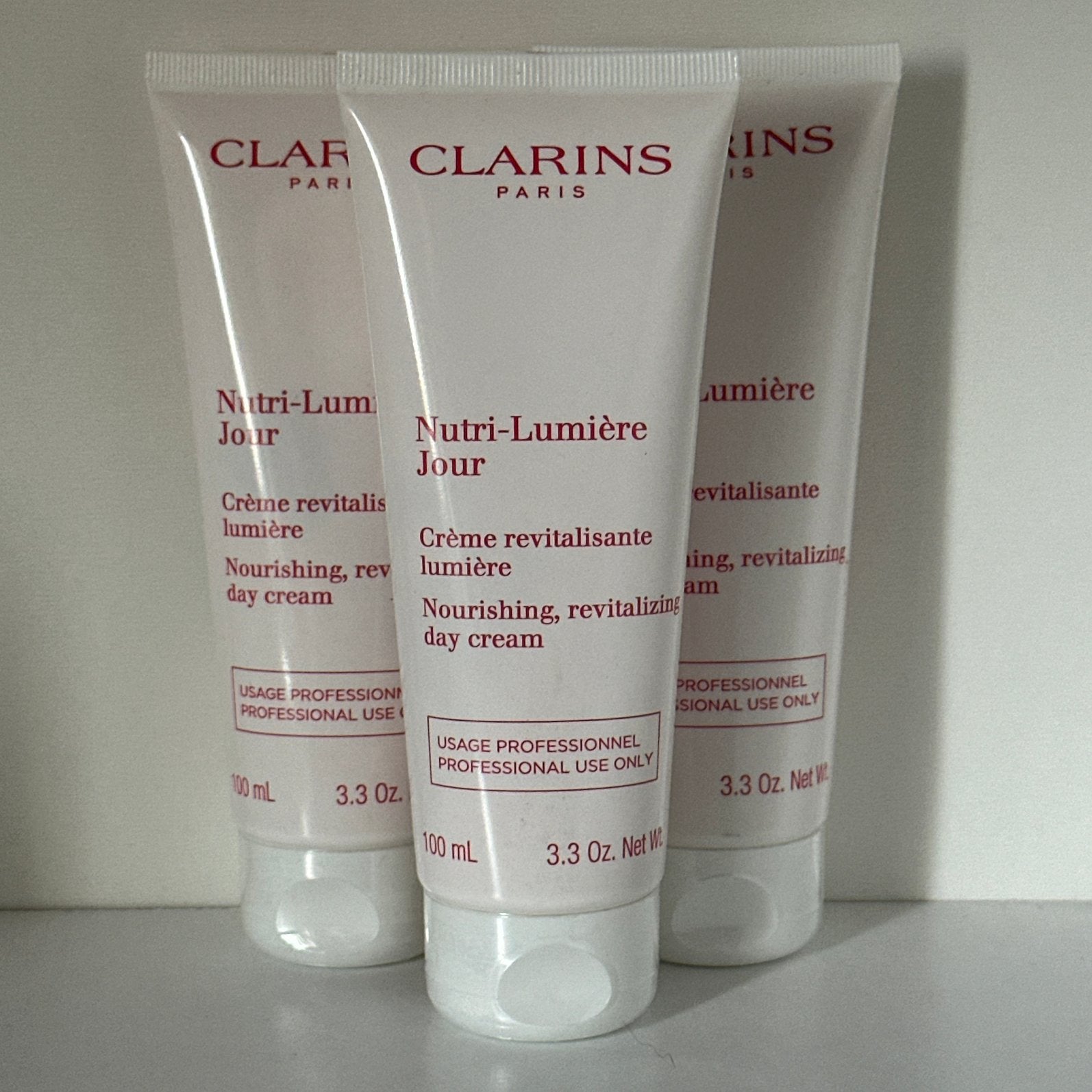 Clarins Nutri-Lumiere Day Cream Salonformaat 100 ml, Ophalen of Verzenden, Nieuw, Gehele gezicht, Verzorging