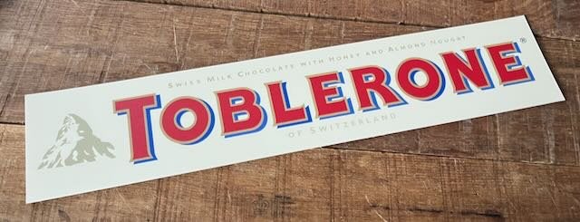 TOBLERONE   reclamebord   50x10 cm    Kunststof, Verzamelen, Ophalen of Verzenden, Zo goed als nieuw, Reclamebord