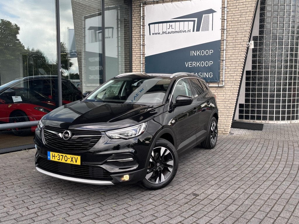 Opel Grandland X 1.2 Turbo Bus. Exec*CAMERA*AUTOM*NAVI*CRUIS, Auto's, Opel, Gebruikt, 1199 cc, Automatische klimaatregeling, Leder en Stof