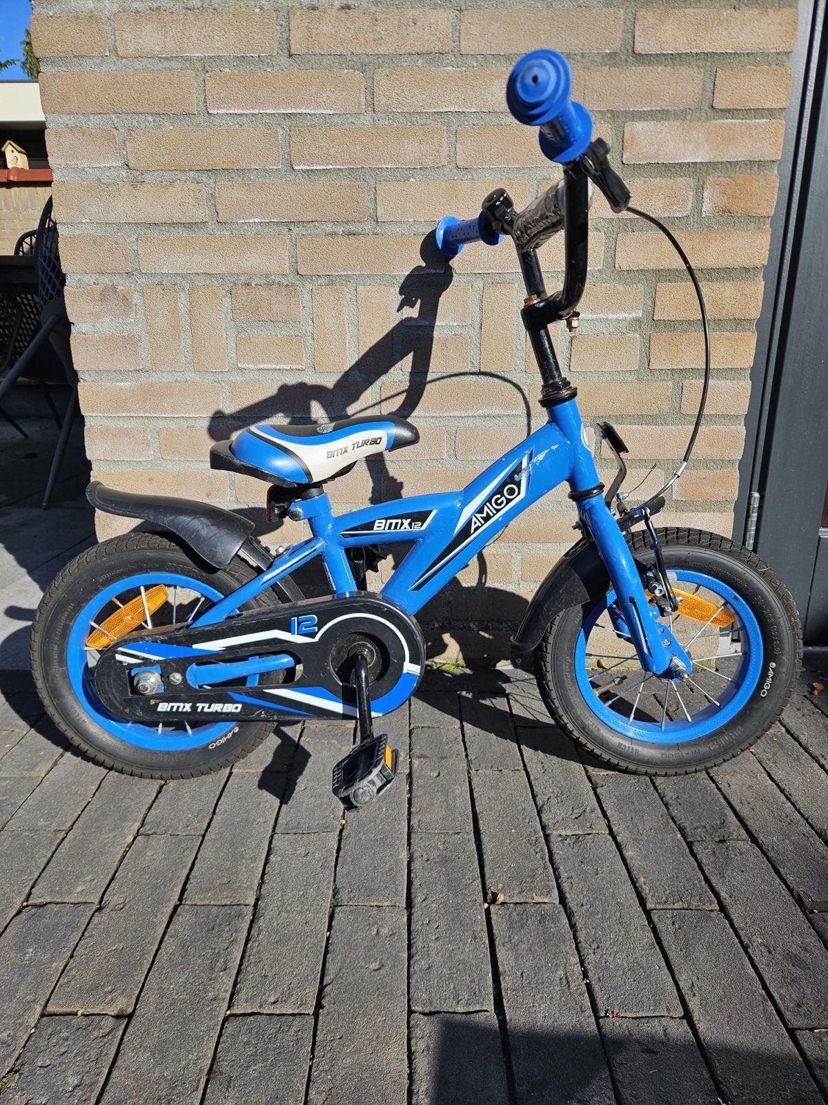Amigo 12 inch kinderfiets met zijwieltjes, Fietsen en Brommers, Ophalen, Zijwieltjes, Gebruikt, Velgrem