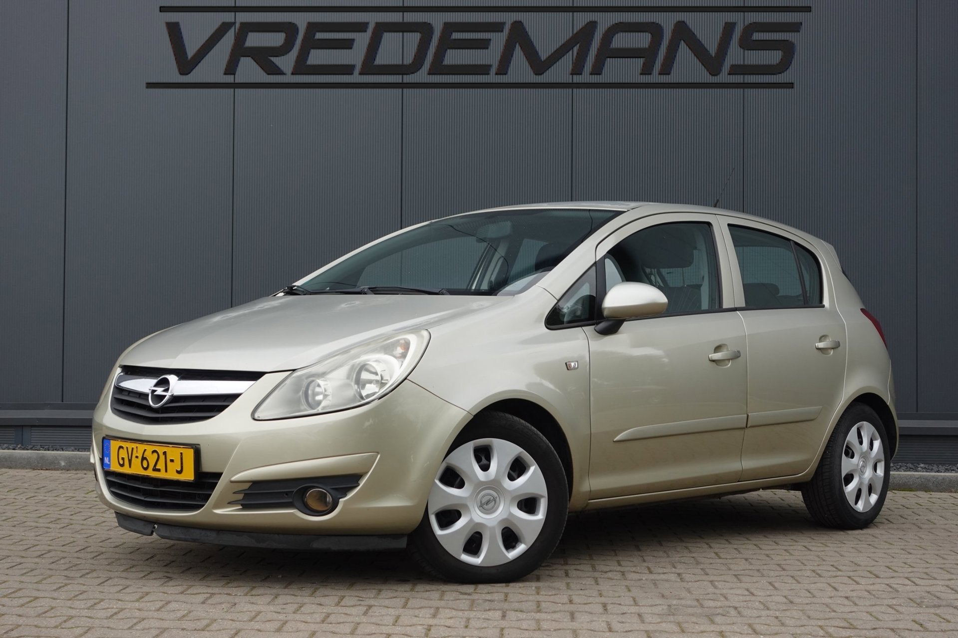 Opel Corsa 1.2-16V Essentia, Auto's, Stof, Gebruikt, Zwart, 4 cilinders