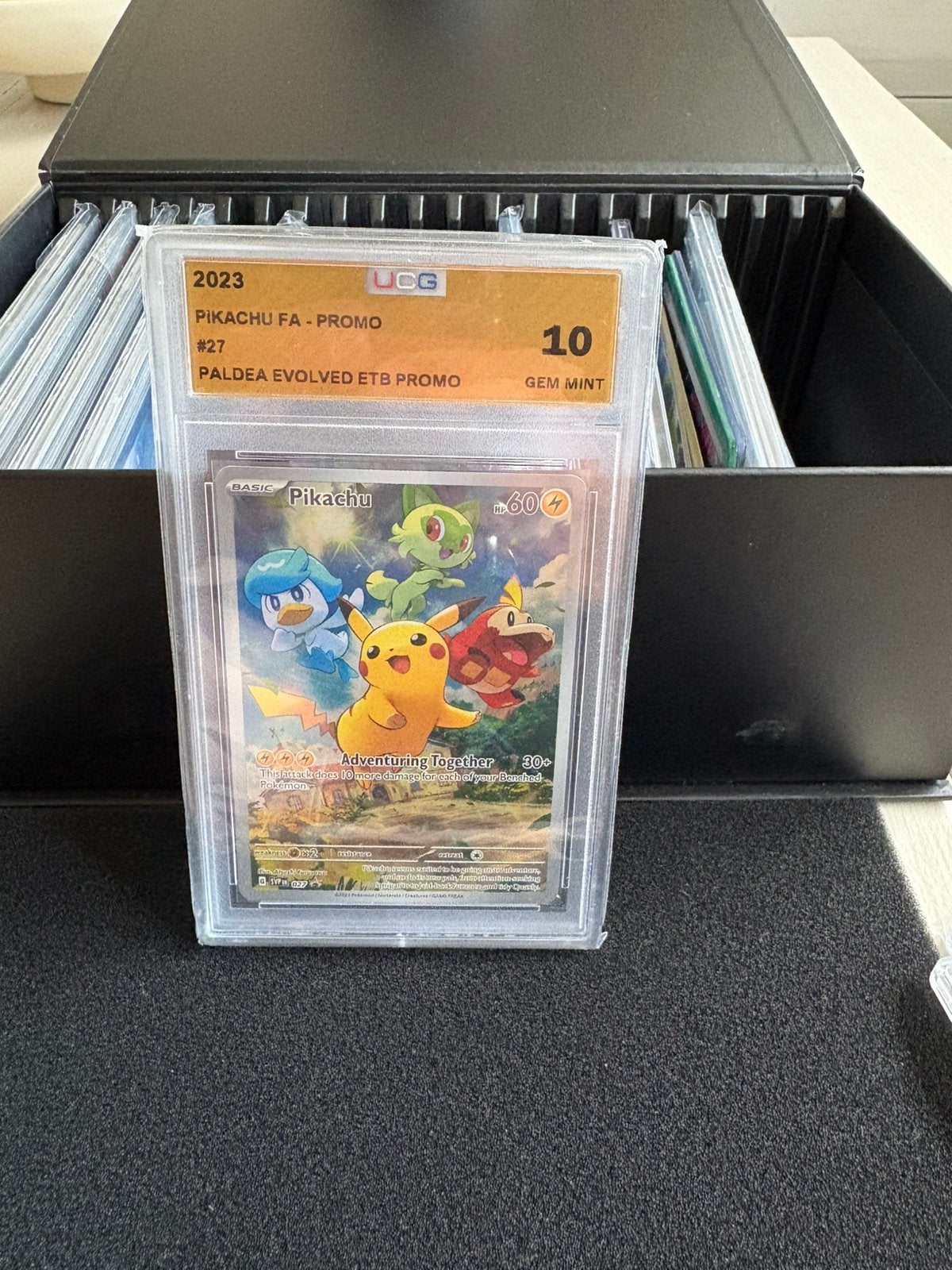 Pikachu paldea evolde promo grade 10, Ophalen of Verzenden, Zo goed als nieuw, Meerdere kaarten, Foil