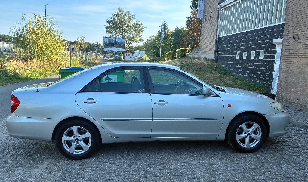 Toyota Camry 2.4 Sol handgeschakeld, 12-2001, Auto's, Toyota, Voorwielaandrijving, Zwart, 4 cilinders, Camry