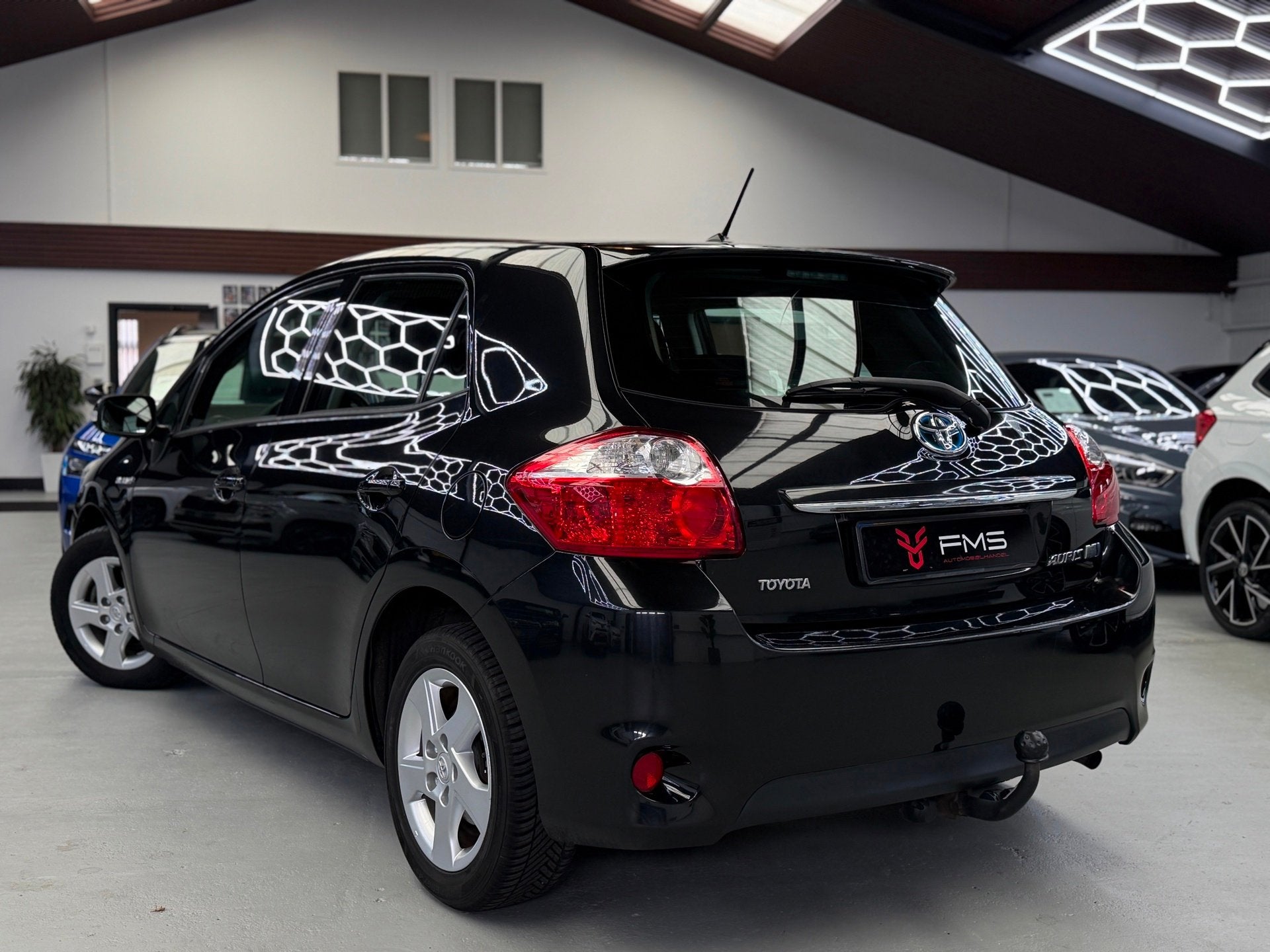 Toyota Auris 1.8 Full Hybrid Aspiration Navigatie, Euro 5, Stof, Gebruikt, Zwart