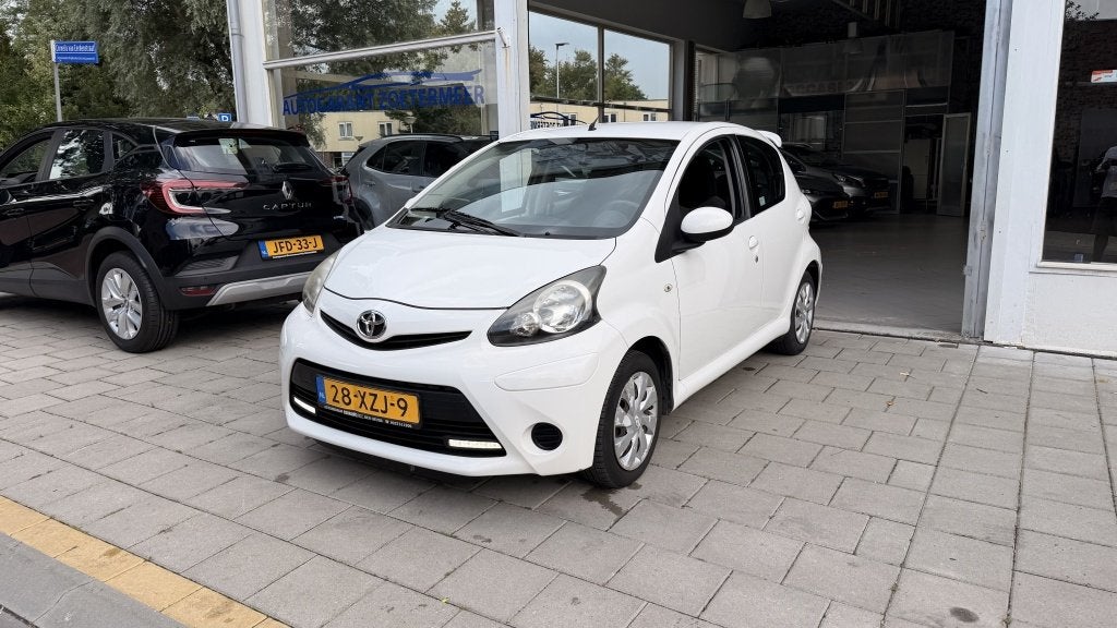 Toyota Aygo 1.0 VVT-i Aspiration (bj 2012), Auto's, Toyota, Euro 5, Gebruikt, 4 stoelen, Emergency brake assist