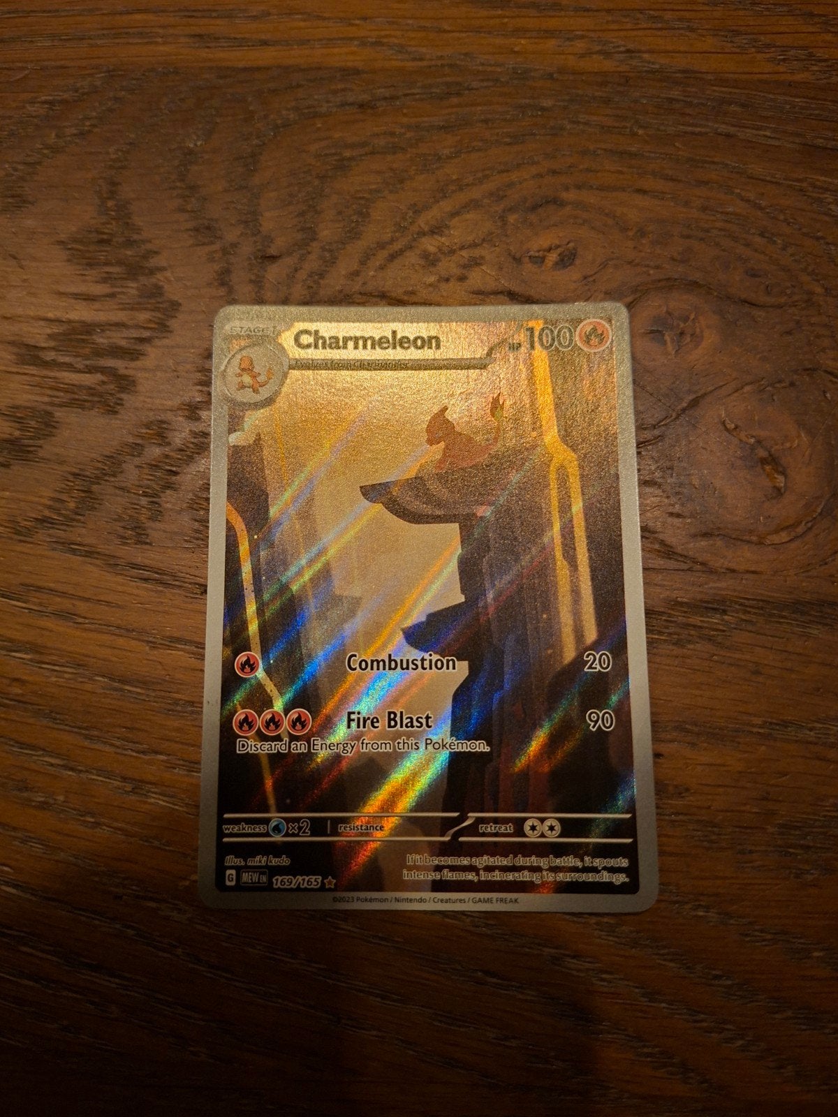 Charmeleon 169/165 Reverse Holo Pokemon kaart, Ophalen, Zo goed als nieuw, Losse kaart