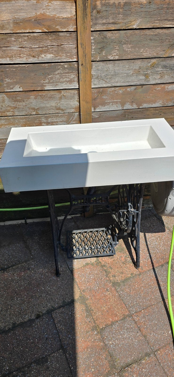 Wasbak op een onderstel van een singer naaimachine, Ophalen