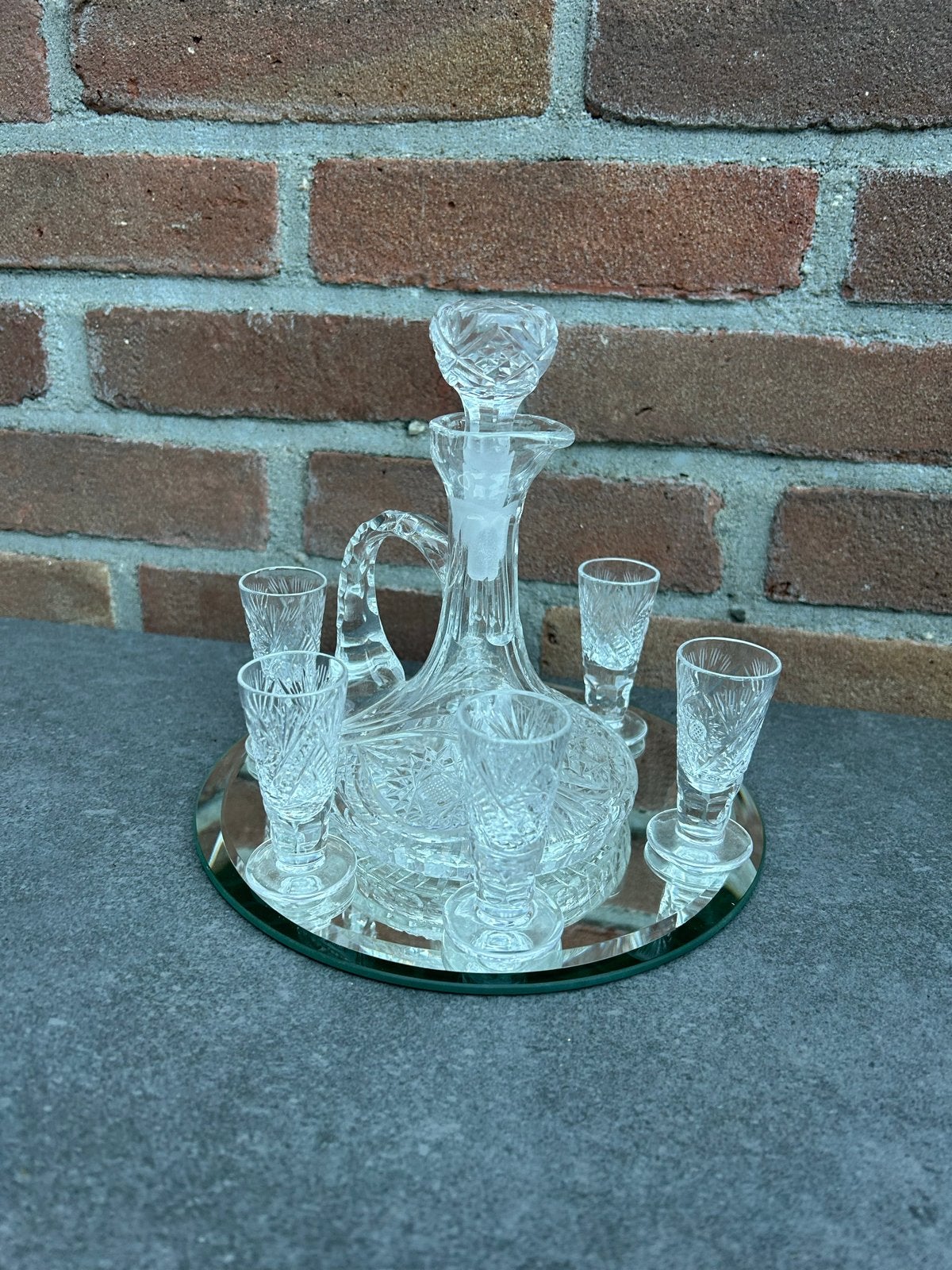 Kristallen karafset met 6 glaasjes op spiegel, Ophalen