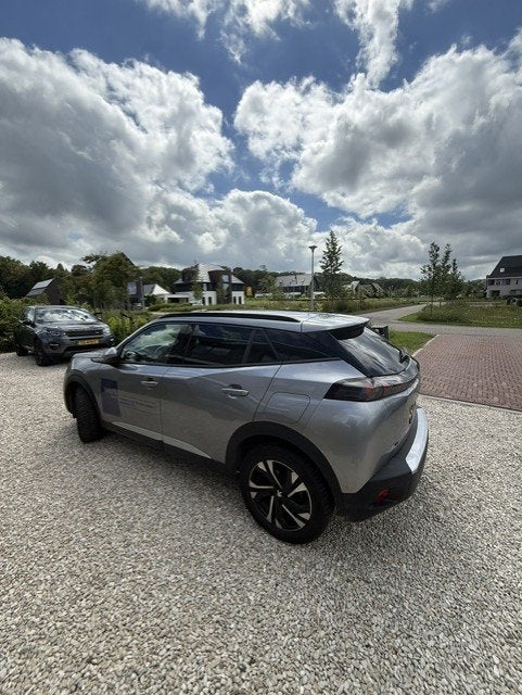 Peugeot e2008 SUV, Auto's, Land Rover, Stof, 4 cilinders, Discovery Sport, Origineel Nederlands