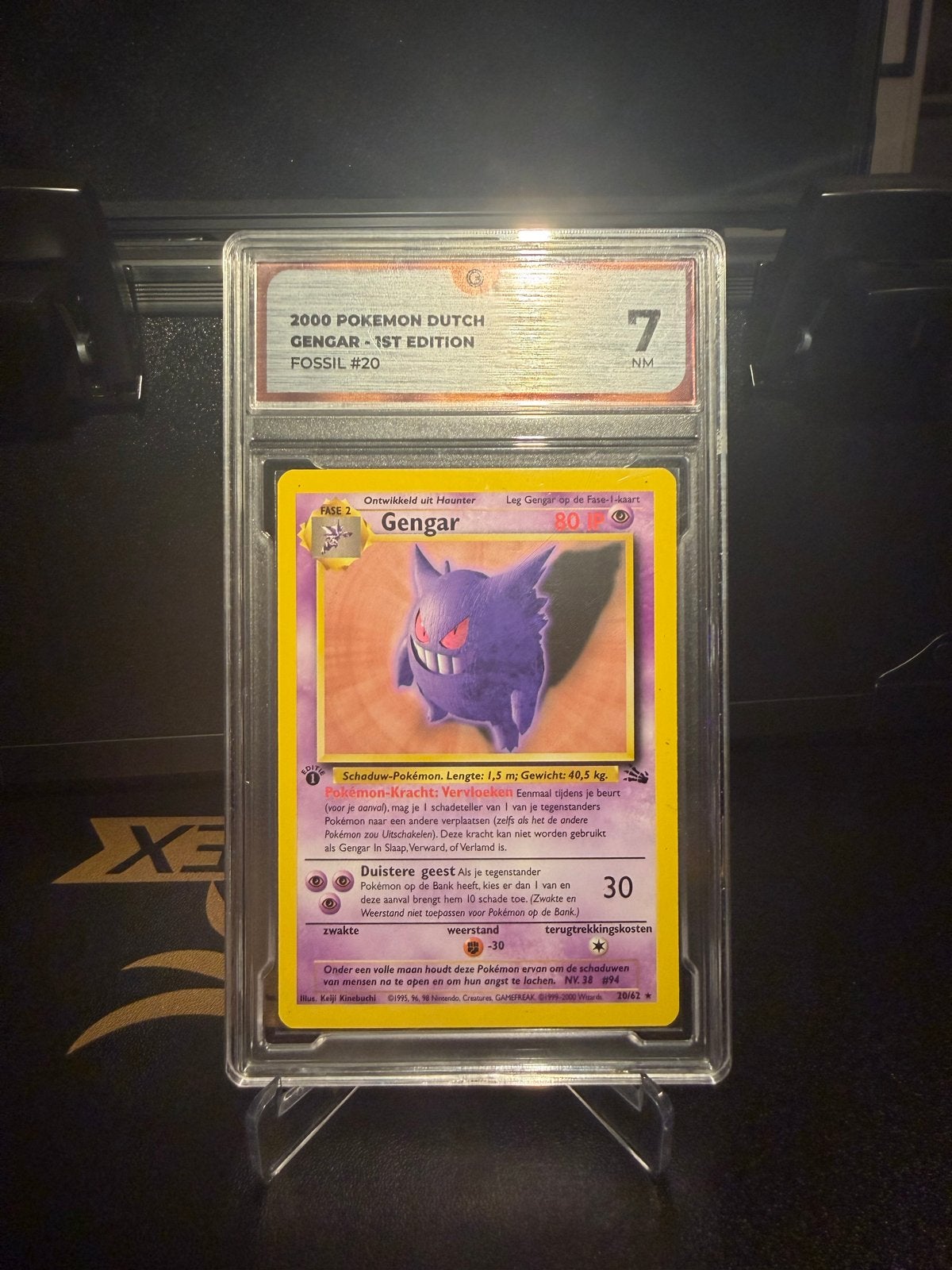 Pokémon Gengar Fossil 1st Edition 2000 Nederlands Graded 7, Verzamelen, Ophalen of Verzenden, Gebruikt