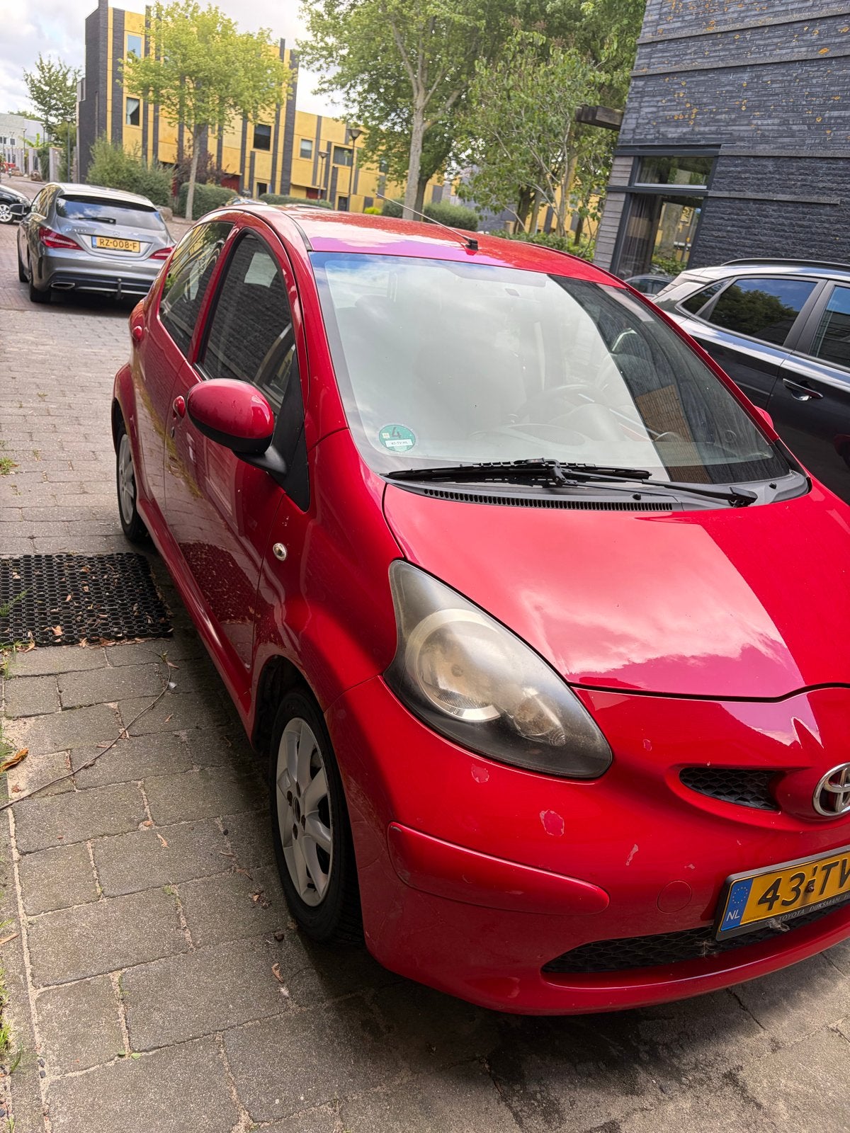 Toyota Aygo 1.0 12V Vvt-i 5DRS 2007 Rood met 1 jaar APK, Voorwielaandrijving, 4 stoelen, 68 pk, Origineel Nederlands