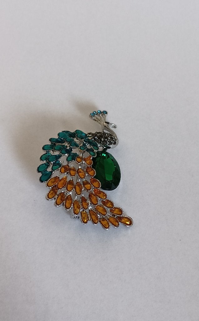 Pauw broche, Sieraden, Tassen en Uiterlijk, Broches, Nieuw, Overige materialen, Overige kleuren, 4 tot 7 cm, Met strass, Ophalen of Verzenden