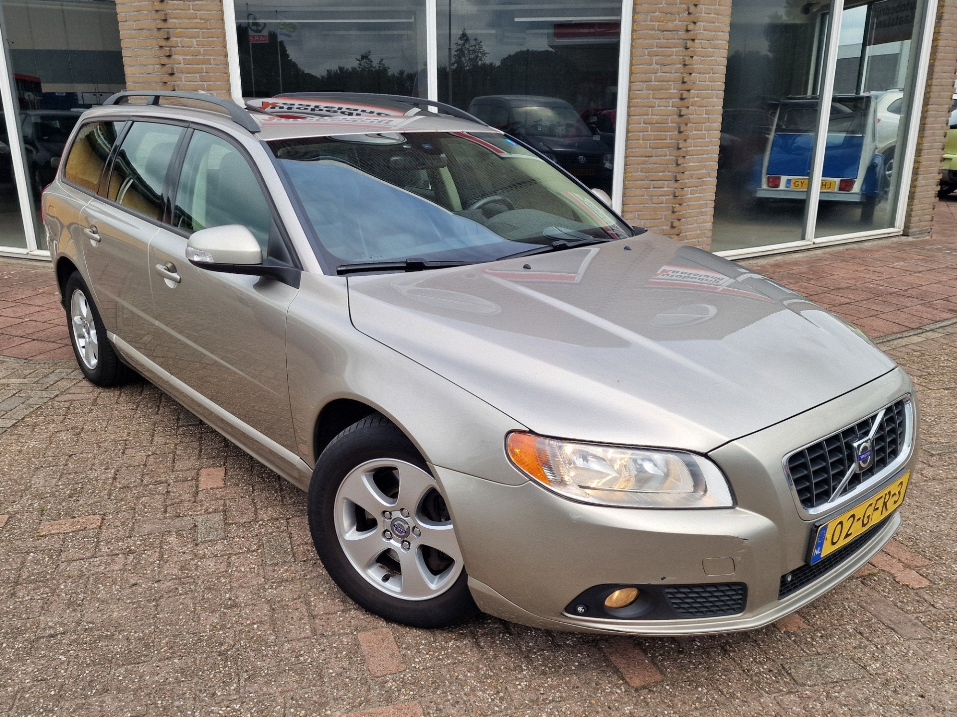 Volvo V70 2.4D D5 Momentum - Leer - Navi - Automaat -, Auto's, Zwart, 163 pk, Diesel, Euro 4