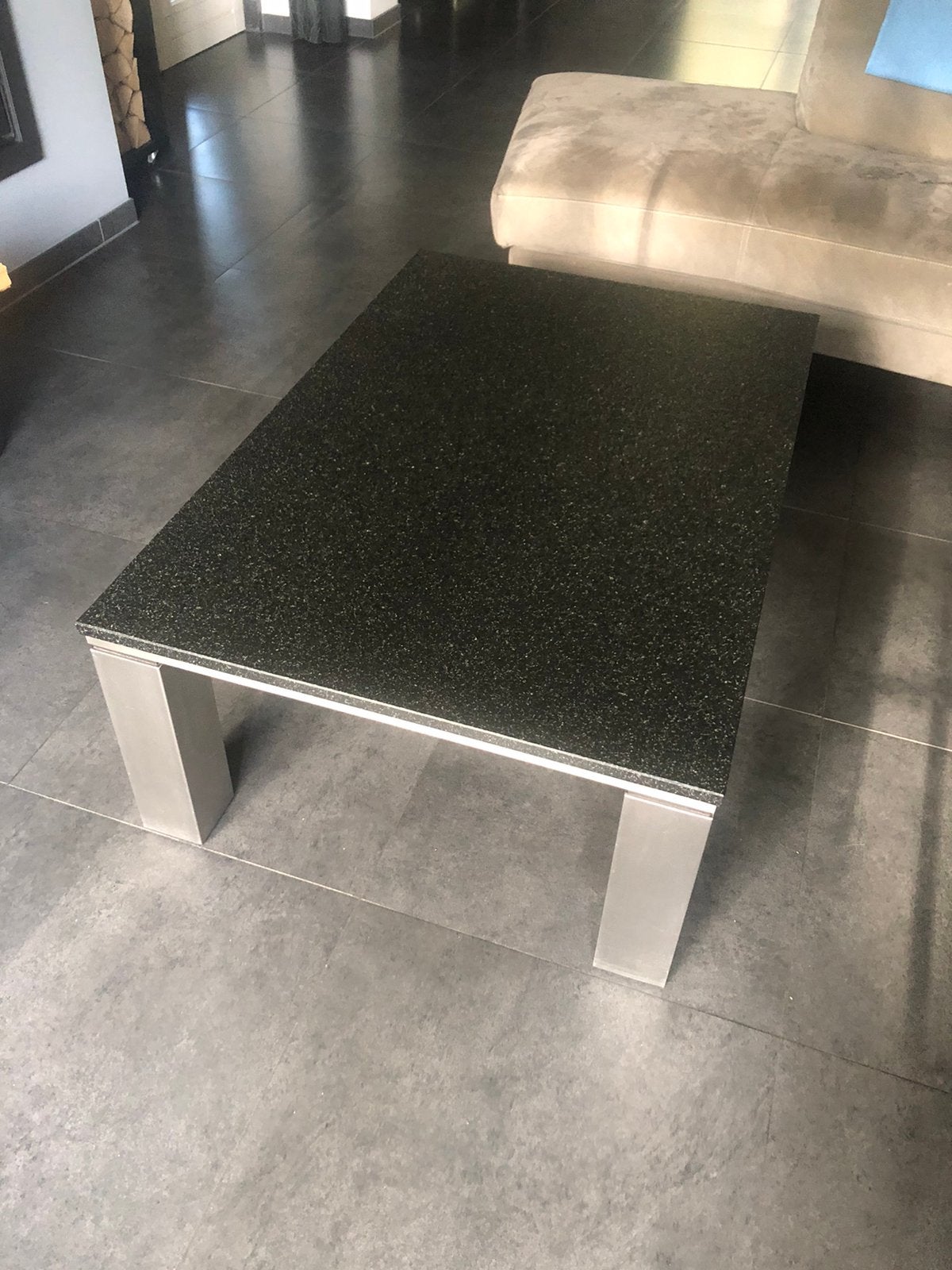 Granieten salontafel met rvs onderstel, Ophalen, Gebruikt, 100 tot 150 cm, 50 tot 100 cm