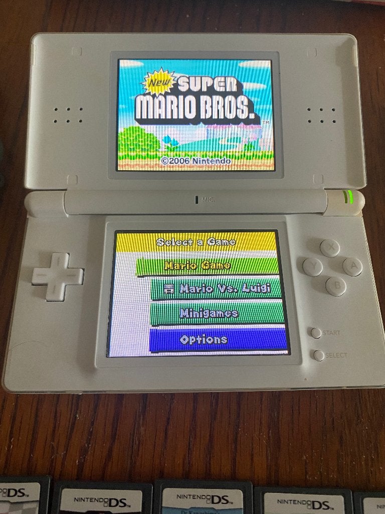 Nintendo DS lite compleet met spellen en oplader, Spelcomputers en Games, Wit, Ophalen of Verzenden, DS Lite, Gebruikt