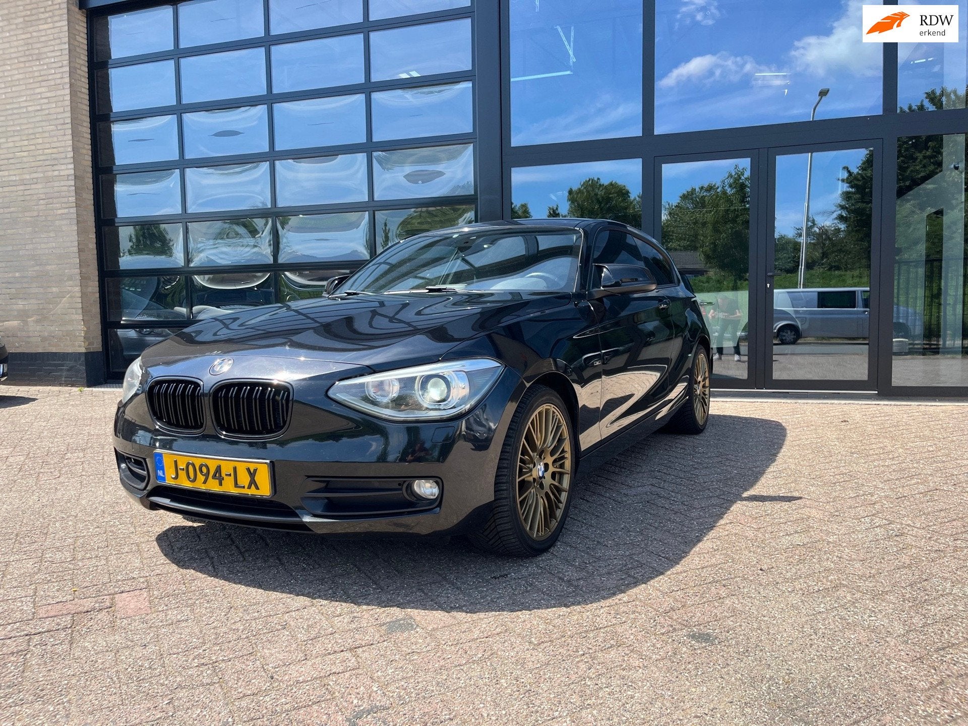 BMW 1-serie 118d xDrive-Sport Edition High Executive, Auto's, BMW, Euro 5, Zwart, Zwart, Leder