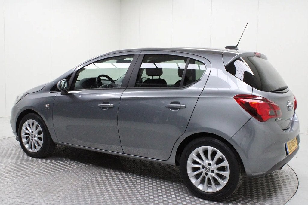 Opel Corsa 1.0 Turbo 120 Jaar Edition | climate € 9.900,00, Stof, Gebruikt, Automatische klimaatregeling, 49 €/maand