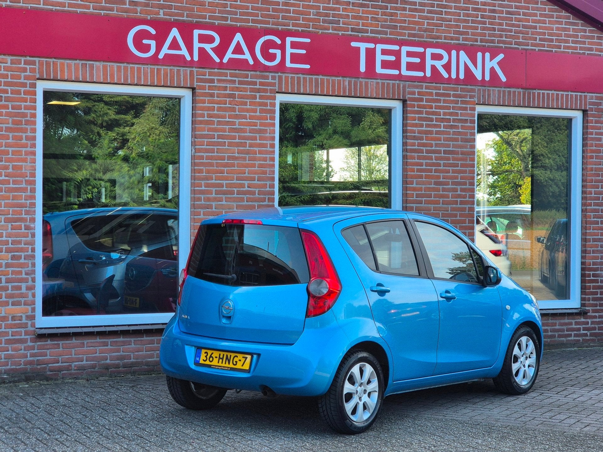 Opel Agila 1.2 Enjoy 86PK 5drs AUTOMAAT airco, cruise, elekt, Auto's, Blauw, Origineel Nederlands, Bedrijf, Grijs