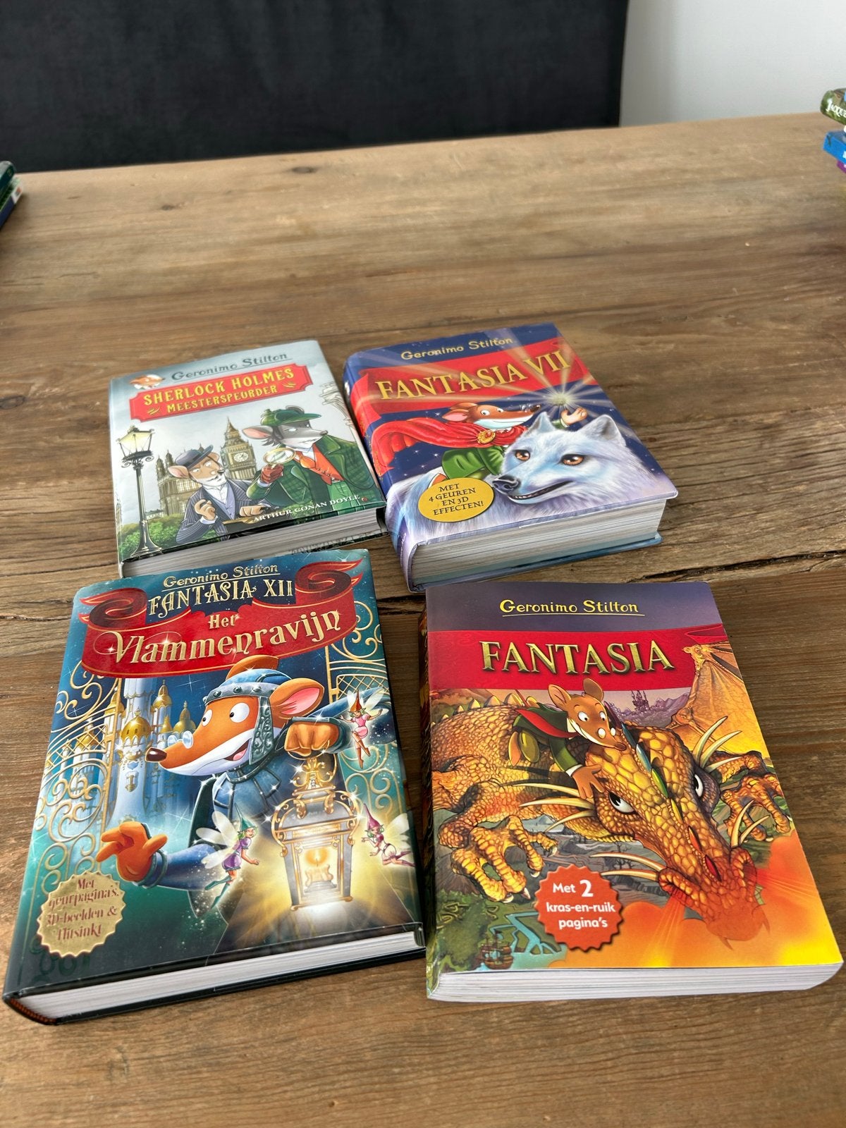 4 Geronimo Stilton boeken - 3x Fantasia, 1x Sherlock Holmes, Boeken, Ophalen of Verzenden, Zo goed als nieuw