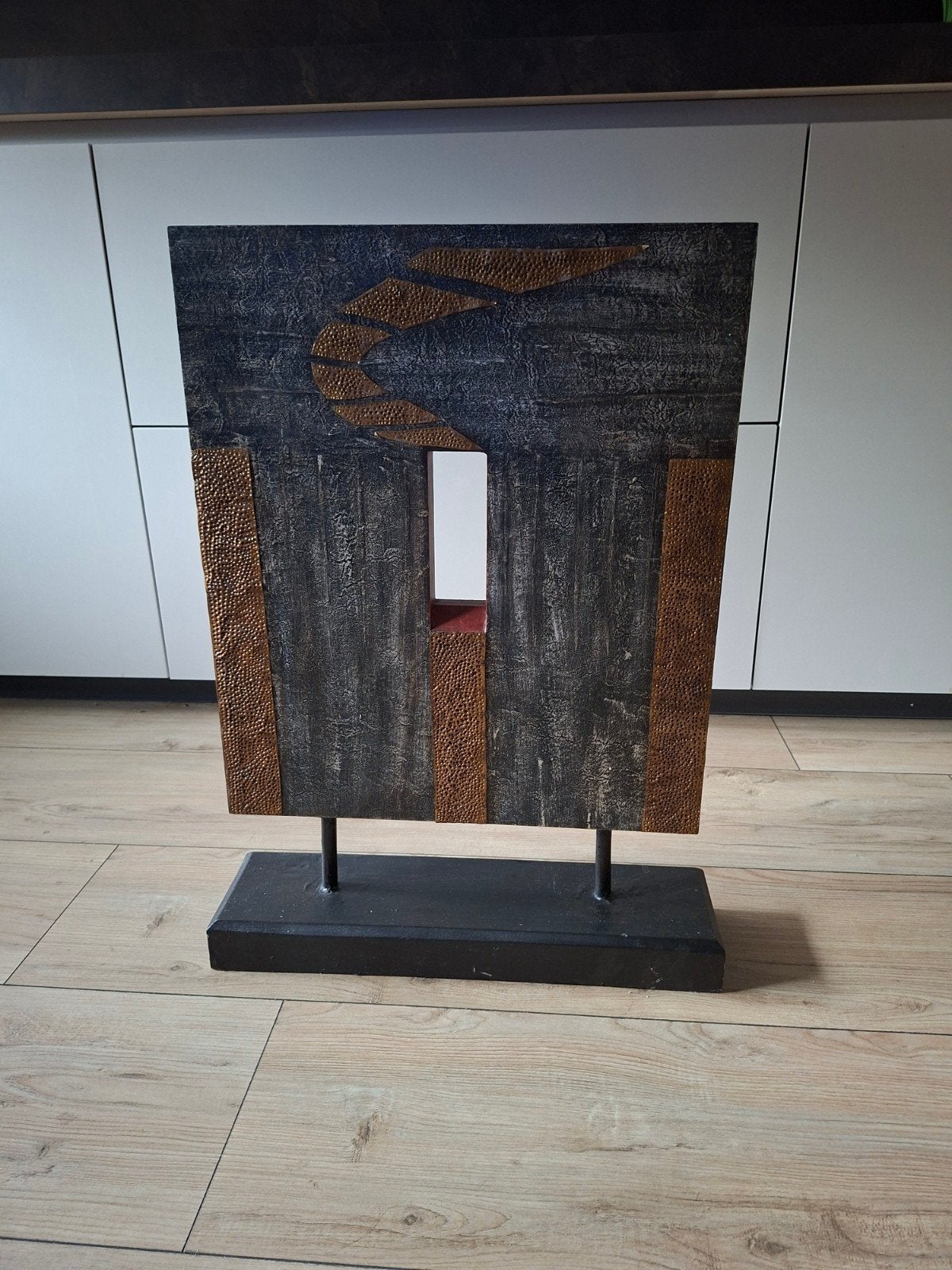 Kunst van hout en metaal, Ophalen