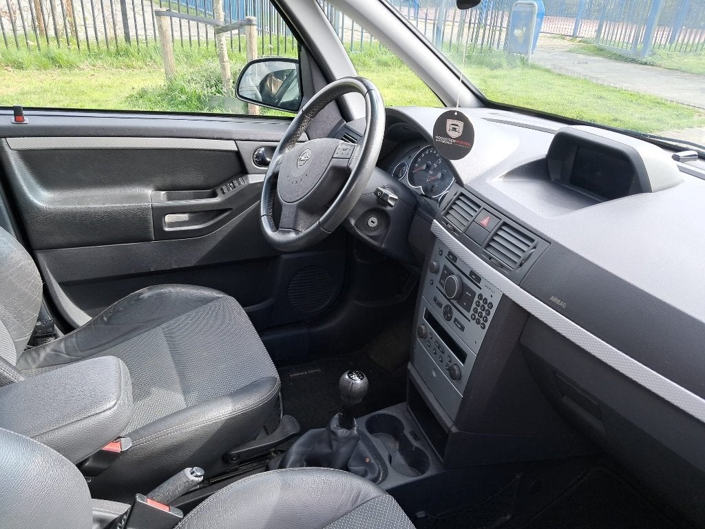Opel Meriva 1.6 16V 77KW 2010 Zwart  prijs 2100,00 euro, Voorwielaandrijving, 15 km/l, 4 cilinders, Leder en Stof