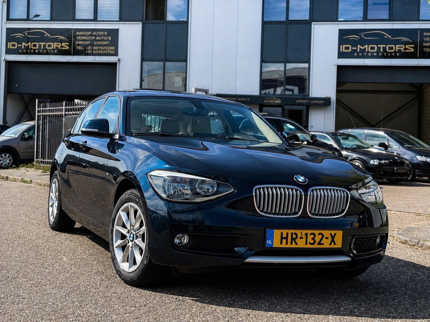 BMW 1-serie 116i Executive LUXE uitvoering DAK LEER, Auto's, 4 cilinders, Met garantie (alle), Blauw, 650 kg