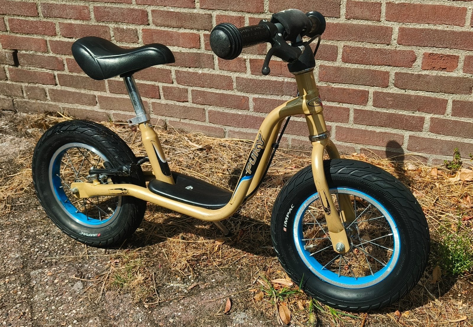 Gouden Puky XL loopfiets met velgrem, Ophalen