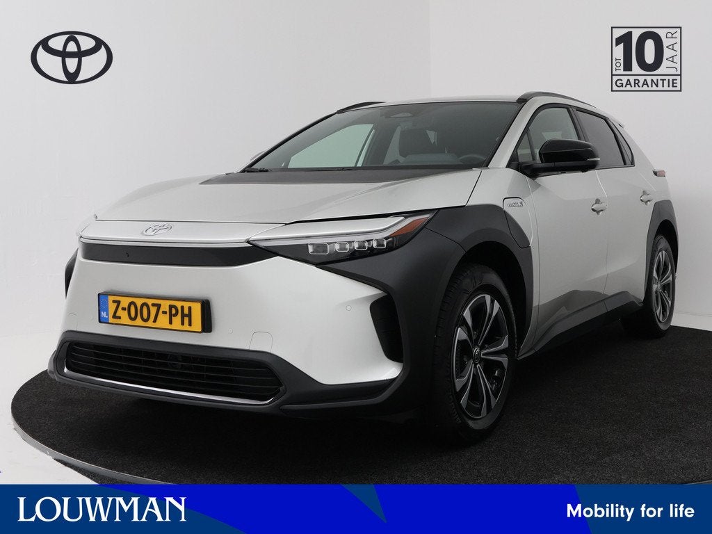 Toyota Bz4x Dynamic 71 kWh | Navigatie | Trekhaak | PDC | BL, Auto's, Toyota, 12 maanden, Stof, Gebruikt, 71 kWh