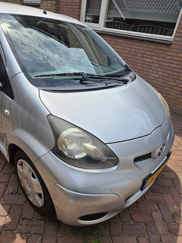 Toyota Aygo 1.0 12V Vvt-i 5DRS 2009 Grijs, Auto's, Voorwielaandrijving, Zwart, 4 stoelen, 68 pk