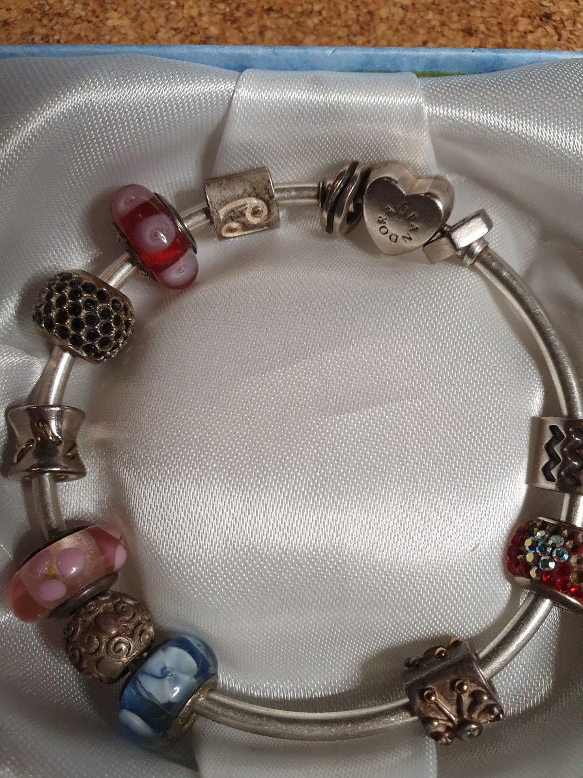 Mooie Pandora armband met 12 zilveren bedels ., Sieraden, Tassen en Uiterlijk, Ophalen of Verzenden, Zo goed als nieuw, Met bedels of kralen