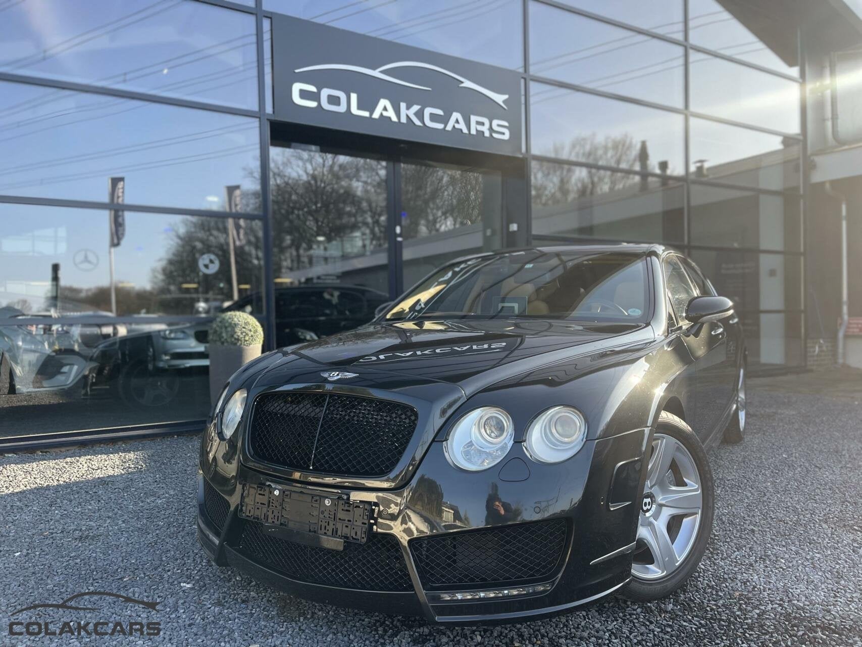 Bentley Continental 6.0 W12 Mansory Garantie nieuw !, Auto's, Bentley, Gebruikt, 12 cilinders, Zwart, Leder