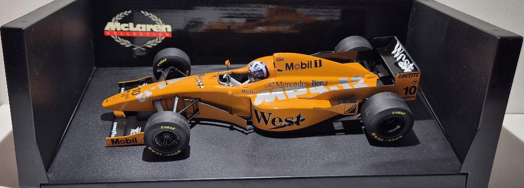 F1 * WEST * McLaren MP4/12 Test David Coulthard  Boxed 1/18, Ophalen of Verzenden, Zo goed als nieuw, Auto, MiniChamps