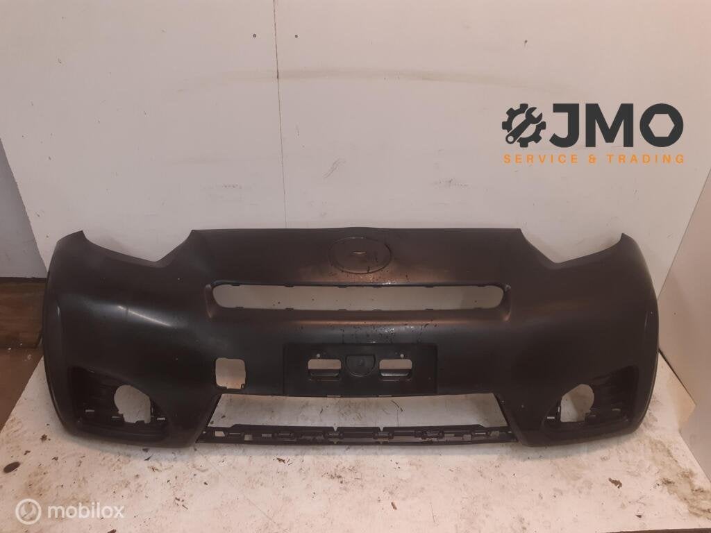 Voorbumper origineel Toyota IQ 2009-2013  5211974020, Voor, Nieuw, Toyota, Ophalen of Verzenden