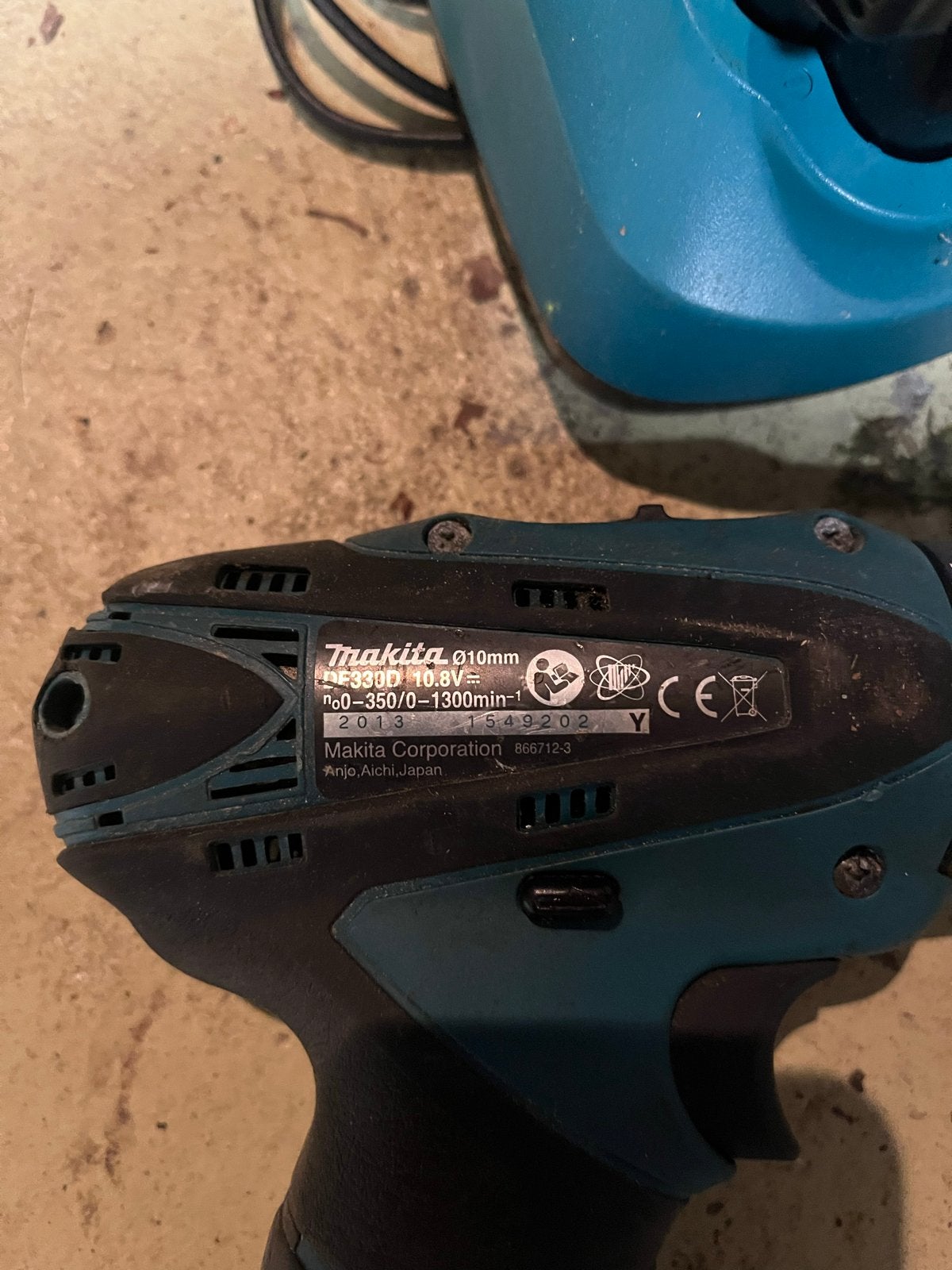 Makita Schroefmachine DDF330D 10.8V met lader en accu, Gebruikt, Variabele snelheid, Ophalen of Verzenden, Boor- en Schroefmachine