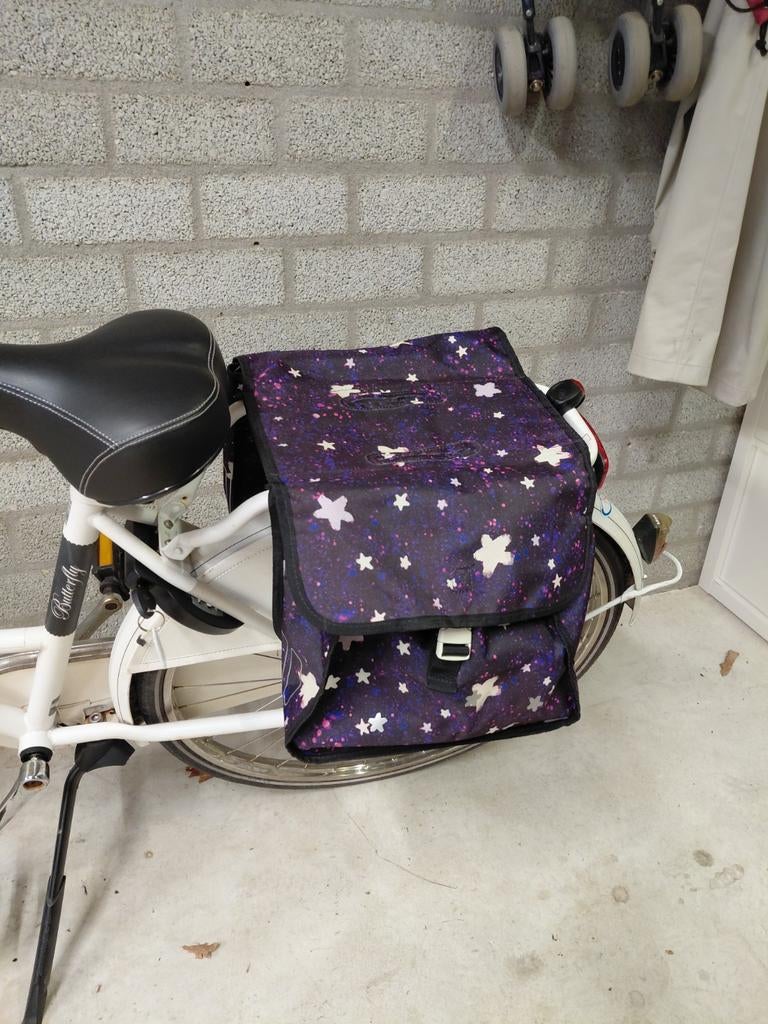 Dubbele fietstas met sterrenprint, Ophalen