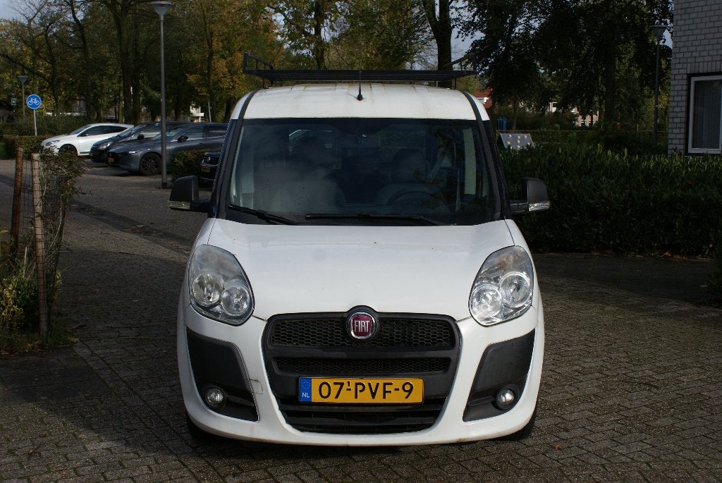 Fiat Doblo 1.4 2011 Wit Dynamic 7 persoons, Auto's, Voorwielaandrijving, Stof, 7 stoelen, Wit