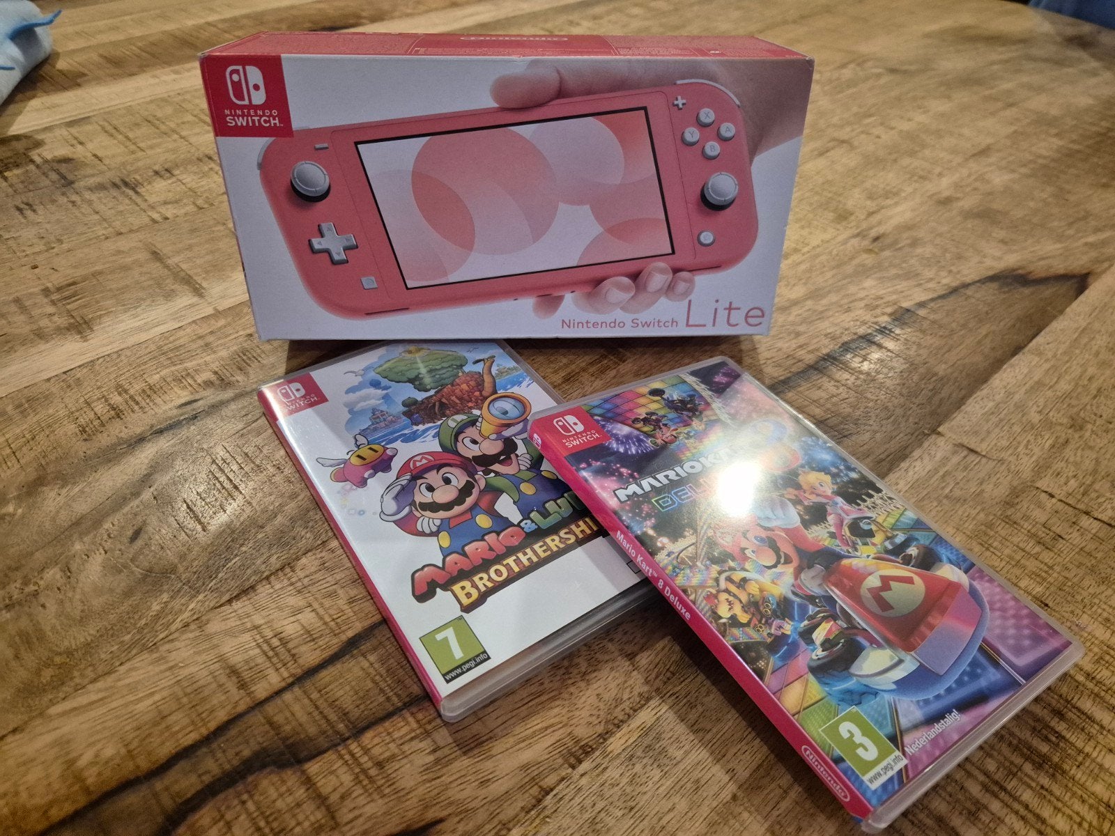 Nintendo Switch Lite Roze, Met games, Zo goed als nieuw, Met 1 controller, Ophalen