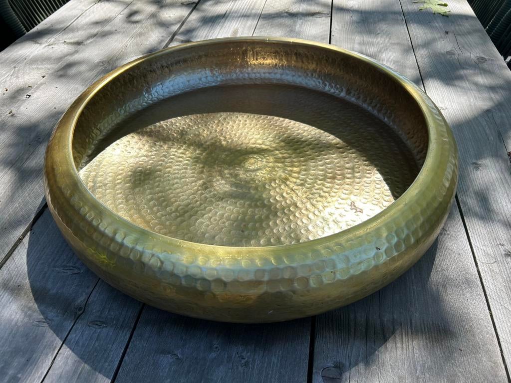 Gouden decoratie schaal, Ophalen